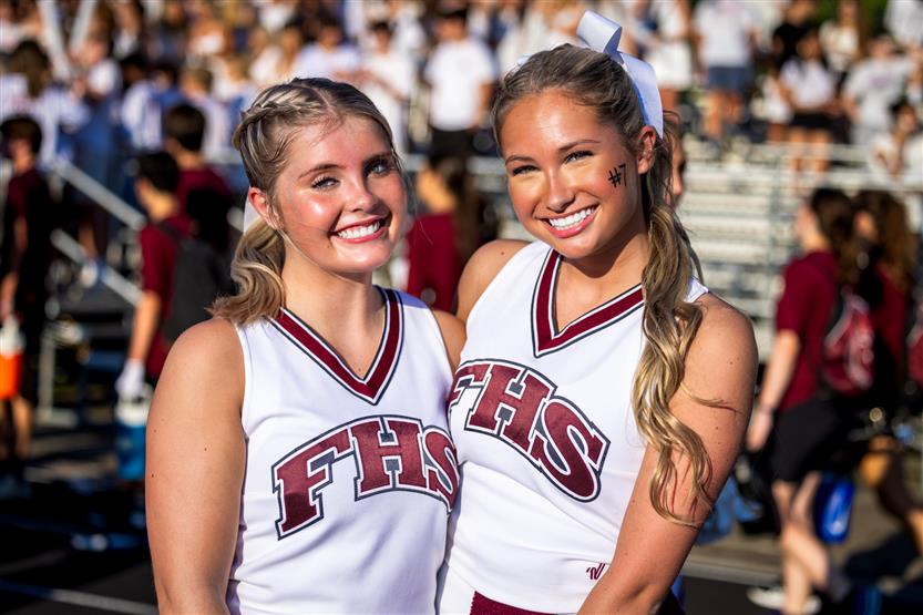 Cheerleaders smile